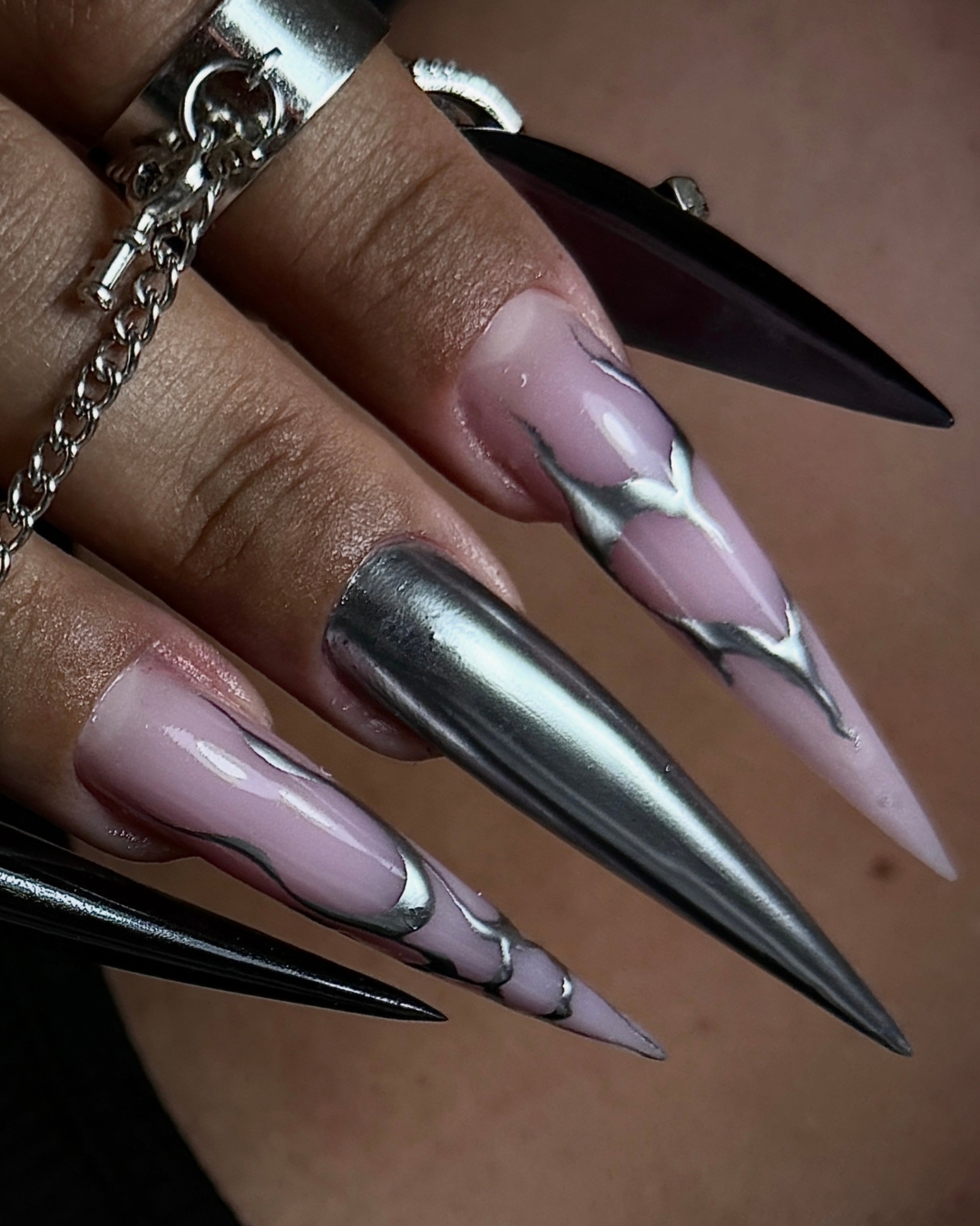 Close up of stilettos displaying Phenomenail™ STRUCT-R INCOGNITO, FIN-X and PIGM-A CHANCE 