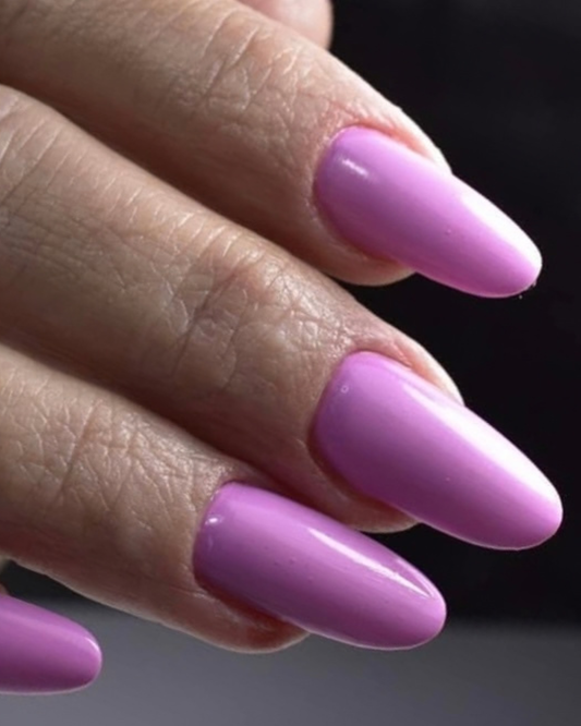 Pony Parade bright-pink gel polish applied to nails