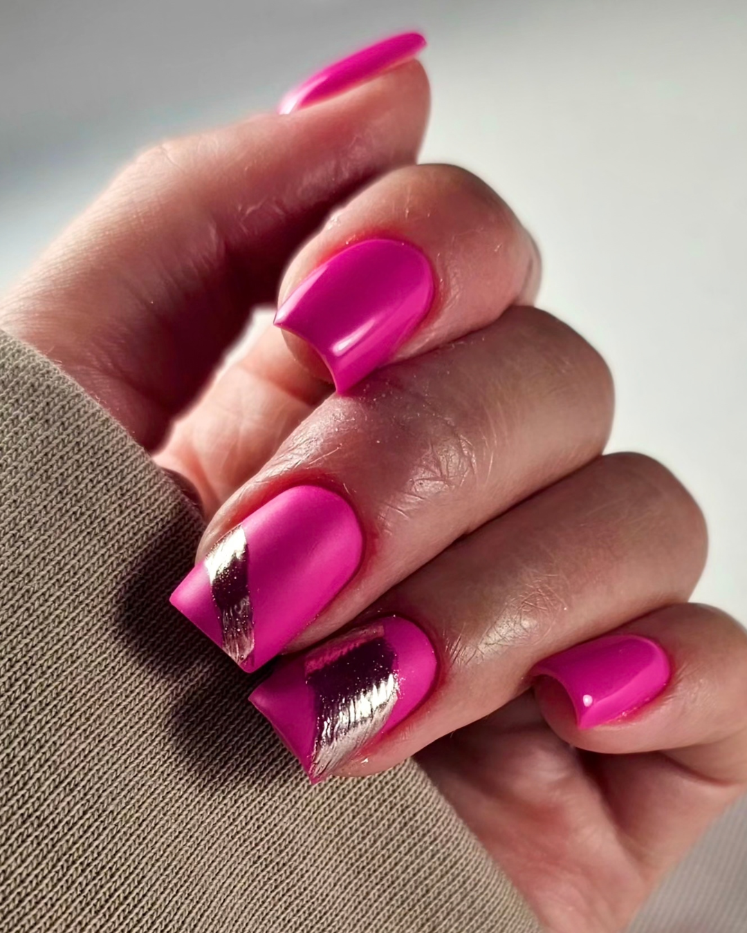 Close up of Square shaped nails displaying Phenomenail™ PIGM-A TOTAL BETTY